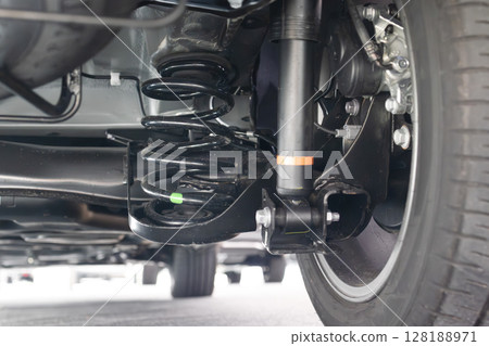 MPV car suspension and rear drive shaft. MPV car suspension and rear drive shaft. 128188971