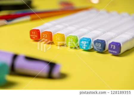 Vibrant alcohol art markers displaying a spectrum of colors like Watermelon Red, Orange, and Cerulean Blue, ideal for artistic design and creative use Vibrant alcohol art markers displaying a spectrum of colors like Watermelon Red, Orange, and Cerulean Blue, ideal for artistic design and creative use 128189355