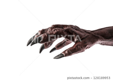 Red devil monster hand isolated on white background with clipping path 128189953
