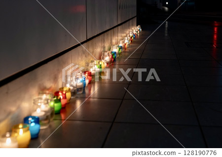Fantastic candles lit at an outdoor event 128190776