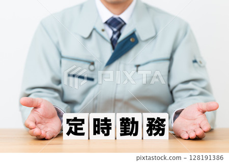 Regular work block and middle-aged male businessman wearing work clothes 128191386