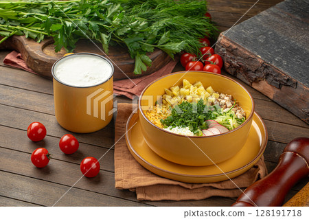 Portion of cold summer russian soup okroshka 128191718