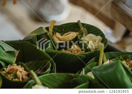 Traditional Thai Food Served in Banana Leaf Cups Traditional Thai Food Served in Banana Leaf Cups 128191955