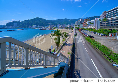 View of the south side from the coast of Atami City, Shizuoka Prefecture (Sun Beach, Atami Castle, resort hotels, etc.) 128193886