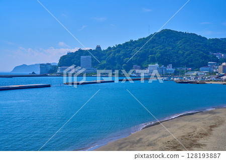 View of the south side from the coast of Atami City, Shizuoka Prefecture (Sun Beach, Atami Castle, resort hotels, etc.) 128193887