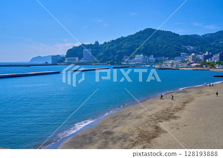 View of the south side from the coast of Atami City, Shizuoka Prefecture (Sun Beach, Atami Castle, resort hotels, etc.) 128193888