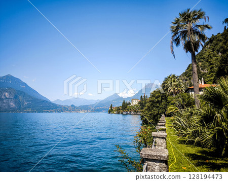 Lush Botanical Garden of Villa Monastero Overlooking Lake Como: Elegant Historic Estate Surrounded by Mediterranean Flora and Alpine Scenery 128194473