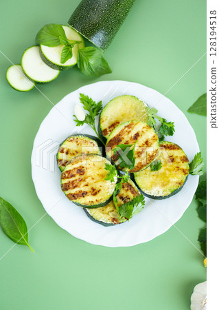 Delicious crispy grilled zucchini without meat Delicious crispy grilled zucchini without meat 128194518