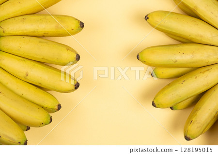 Bunch of mini baby bananas, copy space for text 128195015