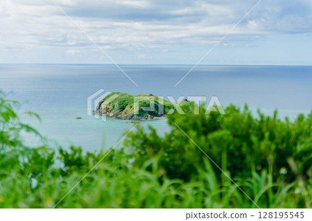 A beautiful island floating in the sea A beautiful island floating in the sea 128195545