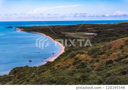 Emerald green sea, white sandy beach and blue sea Emerald green sea, white sandy beach and blue sea 128195546