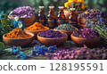 Assortment Of Colorful Spices And Dried Herbs In Wooden Bowls On Dark Stone Background: Aromatic Culinary Ingredients With Basil Leaves Cinnamon Sticks And Peppercorns Arranged For Cooking And Kitchen 128195591