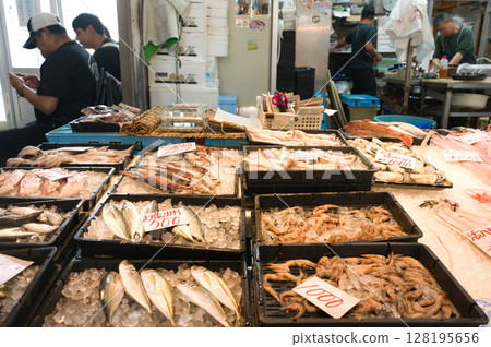 Shopping at the open-air market Shopping at the open-air market 128195656