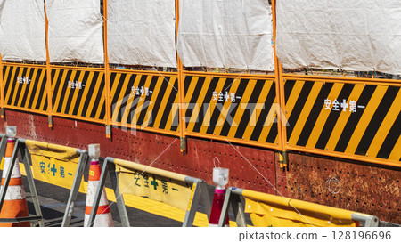 Guard fence at a construction site [Construction, construction, civil engineering, and construction management image] 128196696