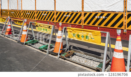 Guard fence at a construction site [Construction, construction, civil engineering, and construction management image] 128196706