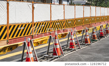 Guard fence at a construction site [Construction, construction, civil engineering, and construction management image] 128196712