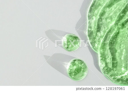 Cosmetic smear gel texture on a white background 128197061