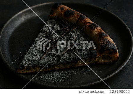 Charcoal crust pizza slice with rosemary herbs on plate, gourmet modern food trend highlighting unique flavors and dark presentation, AI Generative 128198063