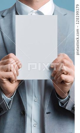 Man holding blank paper 128199179