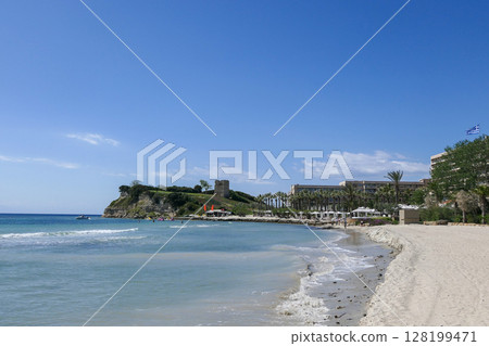 Greece, Sani, Panorama of Sani Beach with the Stavronikita Tower, Kassandra, Chalkidiki 128199471