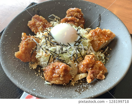 Fried chicken and rice bowl with warm egg, zangi rice bowl with warm egg, fried chicken, zangi, soft-boiled egg Fried chicken and rice bowl with warm egg, zangi rice bowl with warm egg, fried chicken, zangi, soft-boiled egg 128199718