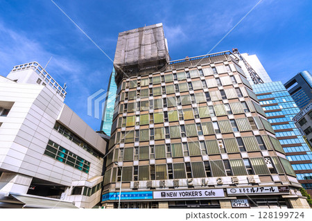 Tokyo cityscape in Japan - View of the demolition work of rooftop advertisements at Shinbashi Station Building No. 2 Tokyo cityscape in Japan - View of the demolition work of rooftop advertisements at Shinbashi Station Building No. 2 128199724