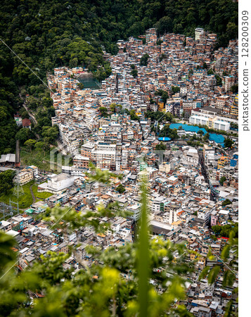 Aerial View Of Rocinha Favela In Rio De Janeiro: Dense Urban Landscape With Colorful Rooftops And Narrow Streets In The Largest Informal Settlement In Brazil 128200309
