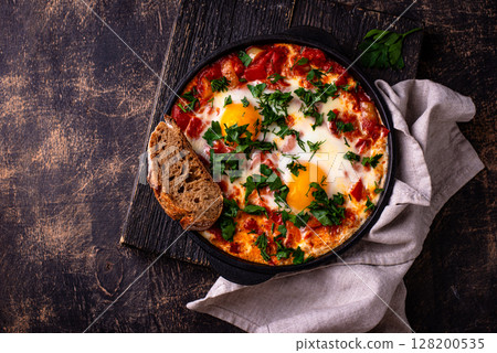 Shakshuka, traditional Jewish breakfast dish Shakshuka, traditional Jewish breakfast dish 128200535