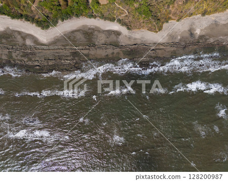 Rocky ocean beach background Rocky ocean beach background 128200987