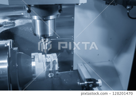 The 5-axis CNC milling machine cutting the automotive part with solid ball end mill tool in the light blue scene. The 5-axis CNC milling machine cutting the automotive part with solid ball end mill tool in the light blue scene. 128201470