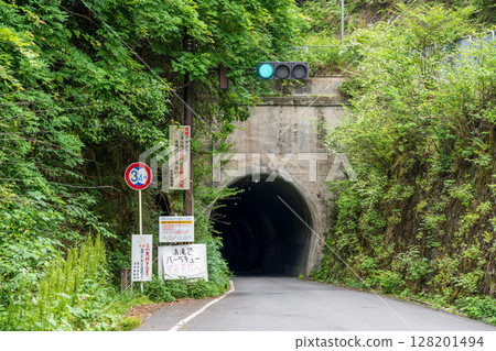 A haunted spot in Kyoto: Kiyotaki Tunnel with a green light. Kyoto Prefecture, Kyoto City, Ukyo Ward 128201494