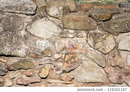 Backgrounds of the old stone wall. 128202187