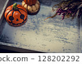 Halloween pumpkin and wooden tray 128202292