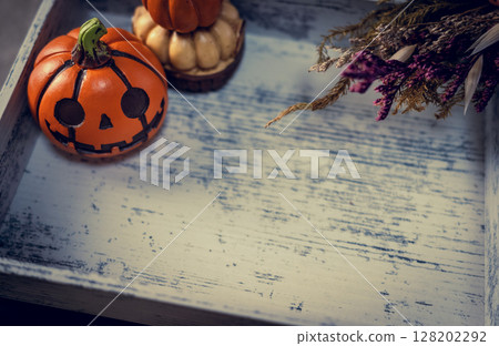 Halloween pumpkin and wooden tray 128202292