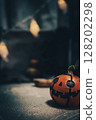 Ghost lights and orange pumpkins 128202298