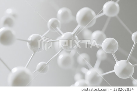 A detailed close-up shows a network of interconnected white molecules or atoms, suggesting scientific research or microscopic structures. 128202834