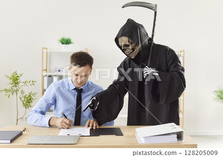 Man makes a deal with Death and puts a signature on a business contract agreement Man makes a deal with Death and puts a signature on a business contract agreement 128205009