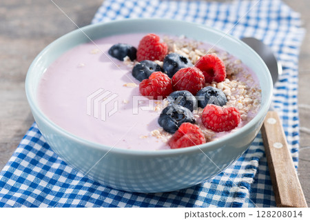 Healthy smoothie bowl with berries 128208014