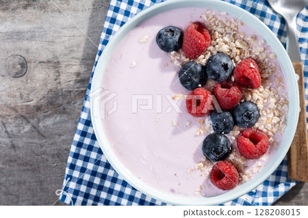 Healthy smoothie bowl with berries 128208015
