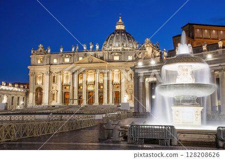 St. Peter's Basilica with fountain in the foreground at dusk. Vatican. Horizontally. St. Peter's Basilica with fountain in the foreground at dusk. Vatican. Horizontally. 128208626