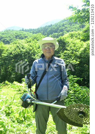 Seniors mowing the grass 128213410