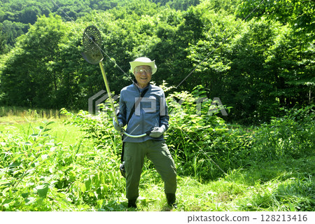 Seniors mowing the grass 128213416