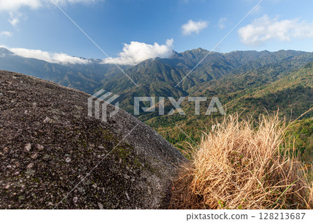 A magnificent view of the colorful autumn scenery of the Yakushima Offshore Alps from Taiko Rock 128213687