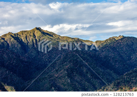 Miyanouradake, one of Japan's top 100 mountains, World Natural Heritage Site Yakushima (Autumn) 128213763
