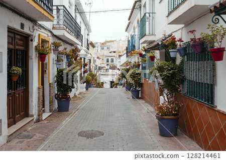 Colorful Flower Street in Old Town Estepona, Malaga, Spain 128214461