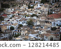 Close up view of the famous Albaicin neighborhood from San Miguel Alto balcony in Granada, Spain. 128214485