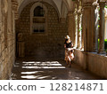 A woman tours a church in Croatia 128214871