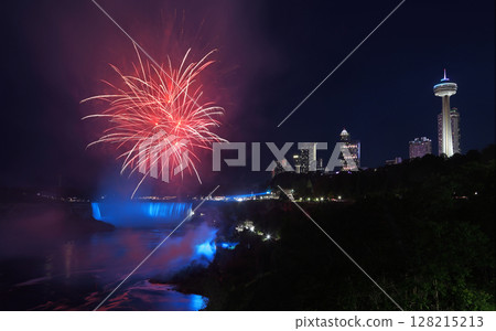 Niagara Falls skyline illuminated at dusk and fireworks, Canada 128215213