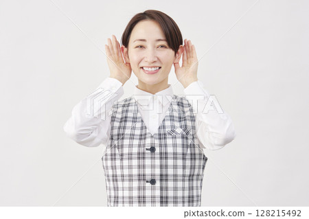 Female office worker listening gesture white background Female office worker listening gesture white background 128215492