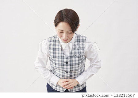 Female office worker bowing white background Female office worker bowing white background 128215507